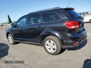2012 Dodge Journey SXT with VIN 3C4PDCBG2CT321589, listed as a Copart auction lot 58360935 with 215,078 mi miles and Clean title. Bid and sale history available at DreamBid. Image 2.