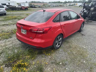 2016 Ford Focus SE with VIN 1FADP3F24GL403372, listed as a IAAI auction lot 42447728 with Not provided miles and . Bid and sale history available at DreamBid. Image 4.
