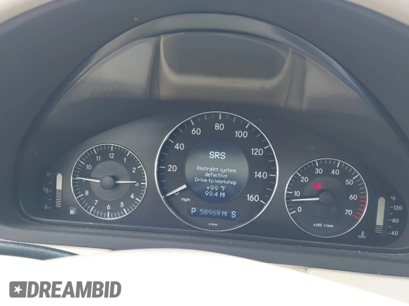 2005 Mercedes-Benz CLK 5.0L with VIN WDBTK75J55F123328, listed as a IAAI auction lot 42082590 with 58,969 mi miles. Bid and sale history available at carsss.com. Image 7.