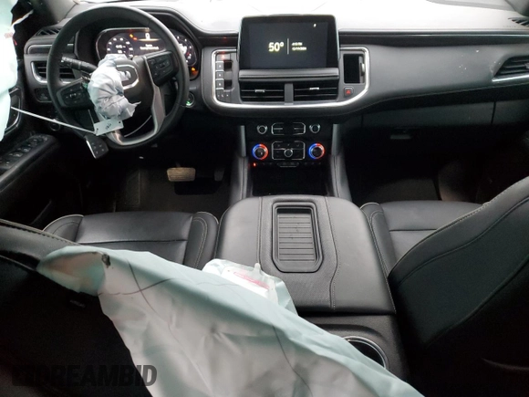 2023 GMC Yukon XL SLT with VIN 1GKS2GKD5PR363433, listed as a Copart auction lot 85979734 with 61,957 mi miles and Salvage Title. Bid and sale history available at DreamBid. Image 8.