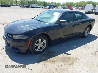 2015 Dodge Charger SE with VIN 2C3CDXBG9FH790573, listed as a IAAI auction lot 42142908 with 195,182 mi miles and . Bid and sale history available at carsss.com. Image 2.