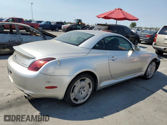 2002 Lexus SC 430 with VIN JTHFN48Y720029932, listed as a Copart auction lot 69795974 with 146,548 mi miles and Salvage Title. Bid and sale history available at DreamBid. Image 3.