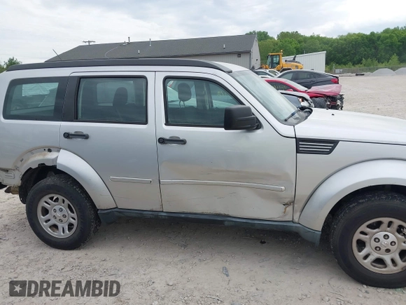 2011 Dodge Nitro SE z VIN 1D4PT2GK3BW600426, wystawiony jako IAAI lot #42227568 z przebiegiem 271 351 mil mil oraz . Historia ofert i sprzedaży dostępna na DreamBid. Obrazek 14.