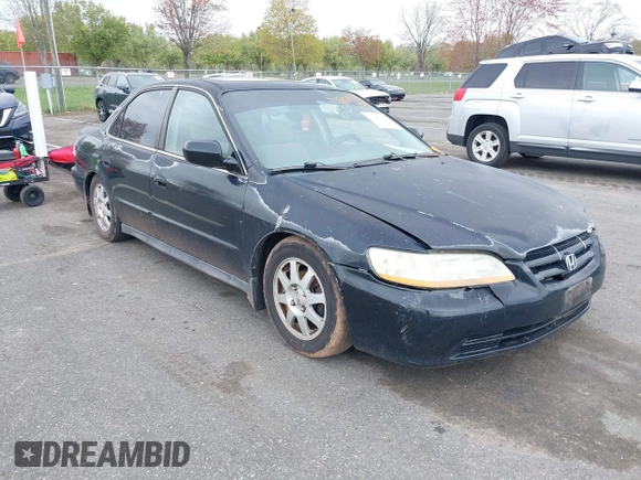 2002 Honda Accord SE z VIN 1HGCG66812A084949, wystawiony jako IAAI lot #42081536 z przebiegiem 309 920 mil mil oraz . Historia ofert i sprzedaży dostępna na DreamBid. Obrazek 1.