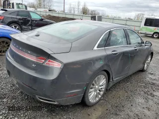 2015 Lincoln MKZ with VIN 3LN6L2GK4FR621797, listed as a Copart auction lot 48238215 with 100,738 mi miles and Salvage Title. Bid and sale history available at DreamBid. Image 3.