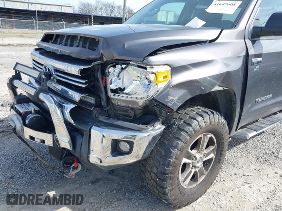 2016 Toyota Tundra 4WD Truck SR with VIN 5TFUW5F19GX548996, listed as a IAAI auction lot 41607605 with 101,194 mi miles. Bid and sale history available at carsss.com. Image 6.