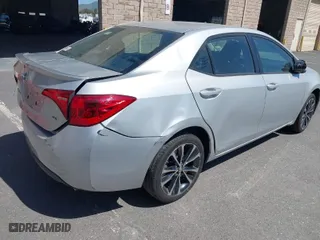 2019 Toyota Corolla L with VIN 5YFBURHE8KP882089, listed as a IAAI auction lot 39545437 with 117,129 mi miles. Bid and sale history available at carsss.com. Image 4.