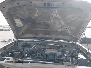 2003 Nissan Frontier XE z VIN 1N6ED27T13C404348, wystawiony jako IAAI lot #41952112 z przebiegiem Nie podano mil oraz . Historia ofert i sprzedaży dostępna na DreamBid. Obrazek 10.