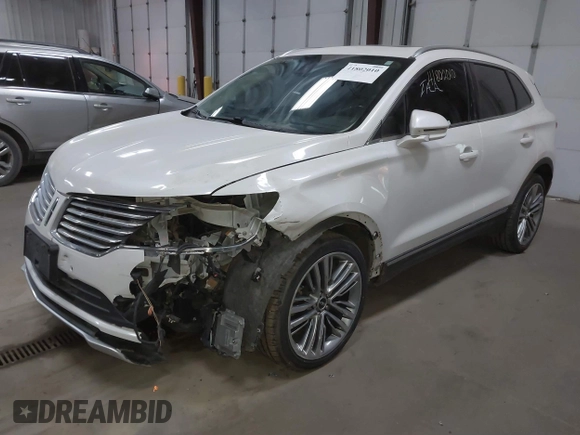 2016 Lincoln MKC Reserve z VIN 5LMTJ3DH6GUJ11160, wystawiony jako IAAI lot #41802010 z przebiegiem 96 861 mil mil oraz . Historia ofert i sprzedaży dostępna na DreamBid. Obrazek 21.