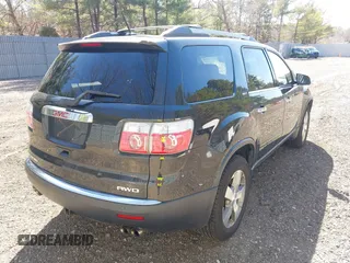 2011 GMC Acadia SLT1 with VIN 1GKKVRED2BJ211678, listed as a IAAI auction lot 41772208 with 147,485 mi miles and . Bid and sale history available at DreamBid. Image 4.