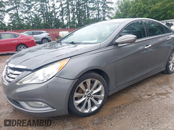 2012 Hyundai Sonata SE z VIN 5NPEC4AC7CH435022, wystawiony jako IAAI lot #42491555 z przebiegiem 176 670 mil mil oraz . Historia ofert i sprzedaży dostępna na DreamBid. Obrazek 6.