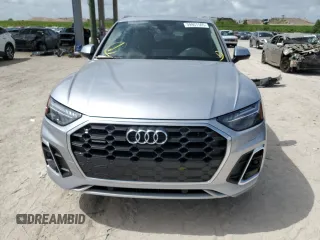 2023 Audi Q5 S line Prestige with VIN WA1FAAFY7P2061803, listed as a Copart auction lot 59907565 with 14,614 mi miles and Salvage title. Bid and sale history available at DreamBid. Image 5.