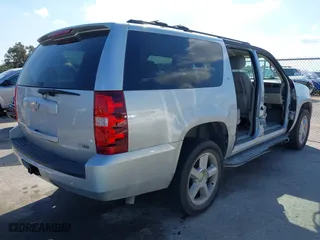 2012 Chevrolet Suburban LT with VIN 1GNSCJE01CR220186, listed as a IAAI auction lot 41476520 with 117,714 mi miles. Bid and sale history available at carsss.com. Image 4.