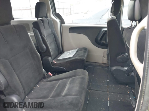 2016 Dodge Grand Caravan SE with VIN 2C4RDGBG0GR171622, listed as a IAAI auction lot 42020600 with 126,306 mi miles and . Bid and sale history available at DreamBid. Image 8.