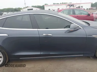 2016 Tesla Model S 90D с VIN 5YJSA1E25GF159226, выставлен на аукционе IAAI как лот 42351745 с пробегом 101 338 миль миль и . История ставок и продаж доступна на DreamBid. Изображение 13.