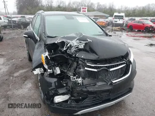 2019 Buick Encore Essence with VIN KL4CJCSM8KB888820, listed as a IAAI auction lot 41108638 with 70,911 mi miles. Bid and sale history available at carsss.com. Image 1.