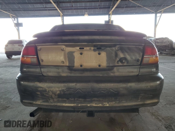 2002 Saturn LS z VIN 1G8JS54F72Y593493, wystawiony jako Copart lot #46571815 z przebiegiem 167 673 mil mil oraz Szkody całkowita. Historia ofert i sprzedaży dostępna na DreamBid. Obrazek 6.