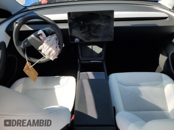 2025 Tesla Model 3 Long Range with VIN 5YJ3E1EA1SF887750, listed as a Copart auction lot 51348825 with 5,530 mi miles and Salvage Title. Bid and sale history available at DreamBid. Image 8.