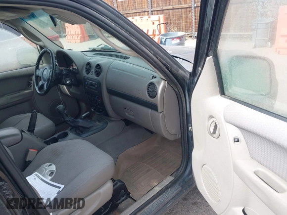 2002 Jeep Liberty Sport with VIN 1J4GL48K02W313000, listed as a IAAI auction lot 41837671 with 168,362 mi miles. Bid and sale history available at carsss.com. Image 5.
