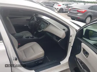 2016 Toyota Avalon Limited z VIN 4T1BK1EB7GU235304, wystawiony jako IAAI lot #42443795 z przebiegiem 197 261 mil mil oraz . Historia ofert i sprzedaży dostępna na DreamBid. Obrazek 5.