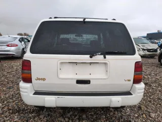 1996 Jeep Grand Cherokee Limited with VIN 1J4GZ78Y0TC185669, listed as a Copart auction lot 79032274 with 184,929 mi miles and Salvage Title. Bid and sale history available at carsss.com. Image 6.