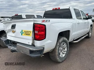 2018 Chevrolet Silverado 1500 LT with VIN 1GCUKREC2JF249062, listed as a Copart auction lot 47498315 with 129,645 mi miles and Clean Title. Bid and sale history available at DreamBid. Image 4.