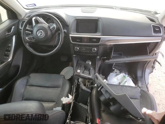2016 Mazda CX-5 Grand Touring with VIN JM3KE4DY5G0865923, listed as a Copart auction lot 51637115 with 151,174 mi miles and Salvage Title. Bid and sale history available at carsss.com. Image 8.