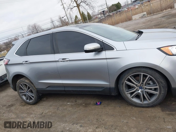 2021 Ford Edge Titanium z VIN 2FMPK4K94MBA32297, wystawiony jako IAAI lot #41834740 z przebiegiem 45 908 mil mil oraz . Historia ofert i sprzedaży dostępna na DreamBid. Obrazek 13.