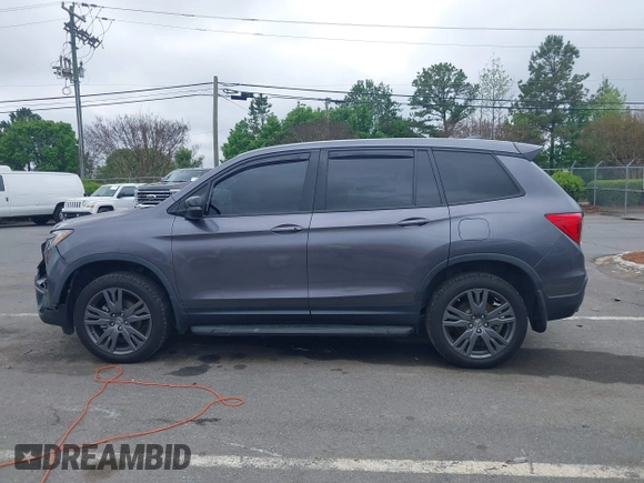 2020 Honda Passport EX-L z VIN 5FNYF8H5XLB018060, wystawiony jako IAAI lot #41961243 z przebiegiem 60 575 mil mil oraz . Historia ofert i sprzedaży dostępna na DreamBid. Obrazek 14.