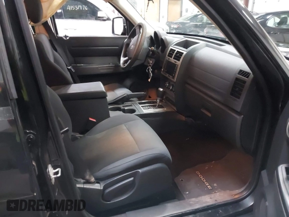 2011 Dodge Nitro Heat with VIN 1D4PU4GK1BW602572, listed as a IAAI auction lot 41529030 with 134,482 mi miles. Bid and sale history available at carsss.com. Image 5.