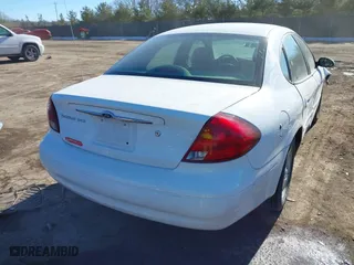 2001 Ford Taurus SES with VIN 1FAFP55231A243171, listed as a IAAI auction lot 41429890 with 131,537 mi miles. Bid and sale history available at carsss.com. Image 4.