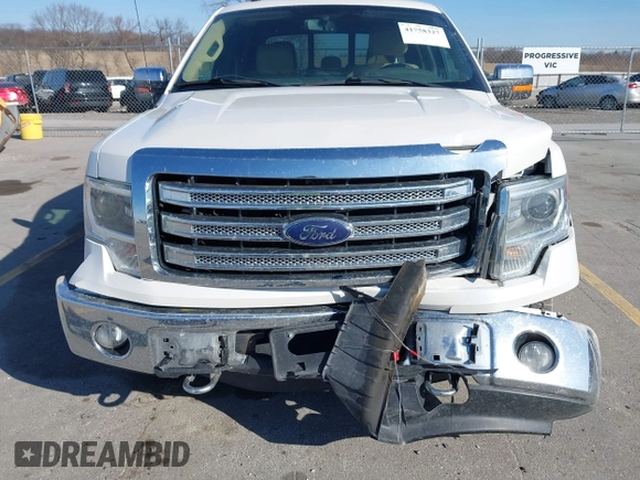 2014 Ford F-150 XL with VIN 1FTFW1EF0EFB17268, listed as a IAAI auction lot 41758327 with 169,607 mi miles. Bid and sale history available at carsss.com. Image 6.