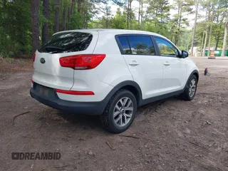 2016 Kia Sportage LX with VIN KNDPB3AC7G7819625, listed as a IAAI auction lot 42214385 with 141,339 mi miles. Bid and sale history available at carsss.com. Image 4.
