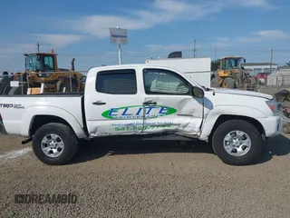 2014 Toyota Tacoma PreRunner with VIN 3TMJU4GN7EM158230, listed as a IAAI auction lot 40010521 with 145,185 mi miles. Bid and sale history available at carsss.com. Image 13.