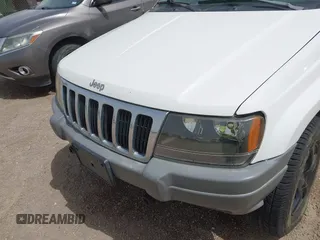 2002 Jeep Grand Cherokee with VIN 1J8GW38S62C219396, listed as a IAAI auction lot 41831930 with 196,167 mi miles and . Bid and sale history available at DreamBid. Image 6.