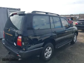 1998 Toyota Land Cruiser with VIN JT3HT05J2W0017214, listed as a IAAI auction lot 41716028 with 214,047 mi miles. Bid and sale history available at carsss.com. Image 4.