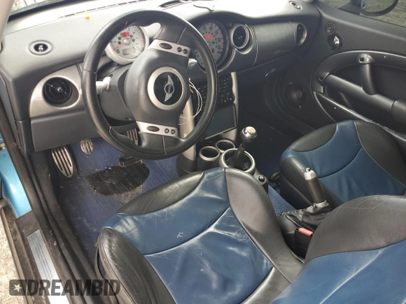 2003 MINI Hardtop S with VIN WMWRE33483TD64131, listed as a Copart auction lot 57428065 with 138,384 mi miles and Clean Title. Bid and sale history available at DreamBid. Image 8.