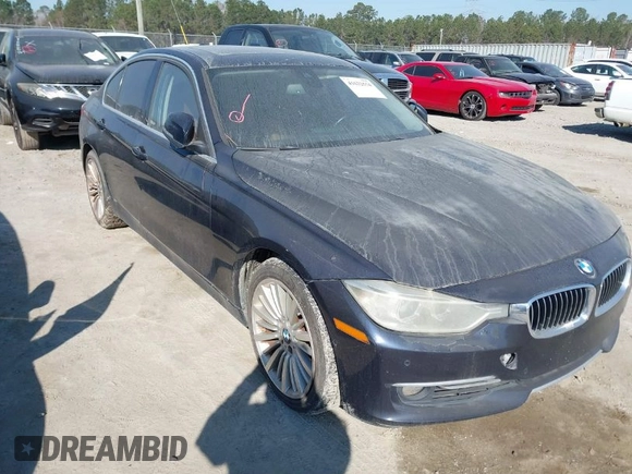 2014 BMW 3 Series 335i with VIN WBA3A9C54EF477943, listed as a IAAI auction lot 41632554 with 102,273 mi miles. Bid and sale history available at carsss.com. Image 1.