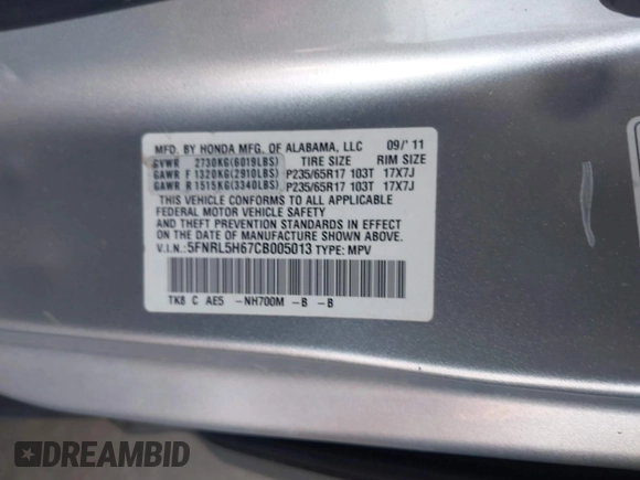 2012 Honda Odyssey EX-L with VIN 5FNRL5H67CB005013, listed as a IAAI auction lot 42295586 with 200,611 mi miles and . Bid and sale history available at DreamBid. Image 9.