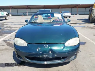 2001 Mazda MX-5 Miata with VIN JM1NB353410203981, listed as a IAAI auction lot 42028077 with Not Provided miles and . Bid and sale history available at DreamBid. Image 12.