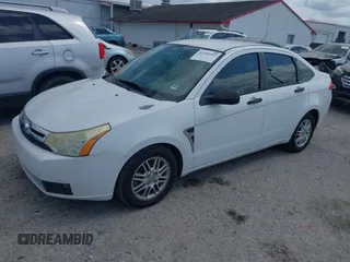 2008 Ford Focus SE with VIN 1FAHP35N78W298887, listed as a IAAI auction lot 42105391 with 215,377 mi miles. Bid and sale history available at carsss.com. Image 2.