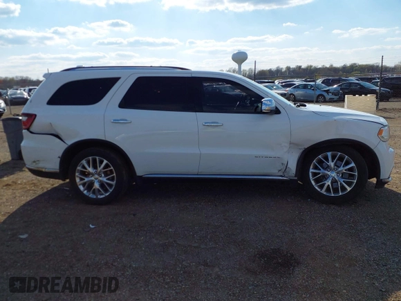2015 Dodge Durango Citadel с VIN 1C4RDHEG8FC194428, выставлен на аукционе IAAI как лот 42029650 с пробегом 105 394 миль миль и . История ставок и продаж доступна на DreamBid. Изображение 13.
