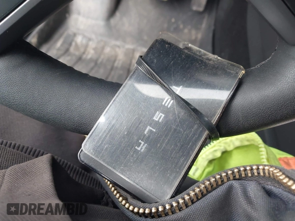 2023 Tesla Model 3 Long Range with VIN 5YJ3E1EB6PF673532, listed as a IAAI auction lot 41885716 with 39,690 mi miles and . Bid and sale history available at DreamBid. Image 11.