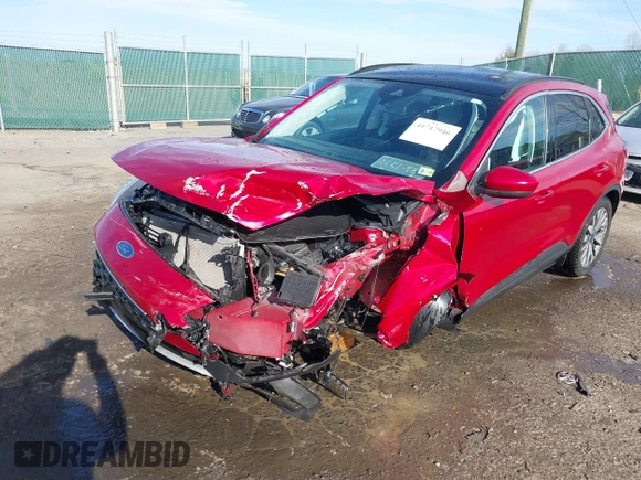 2021 Ford Escape Titanium with VIN 1FMCU9J9XMUA70800, listed as a IAAI auction lot 41717946 with Not Provided miles and . Bid and sale history available at carsss.com. Image 6.