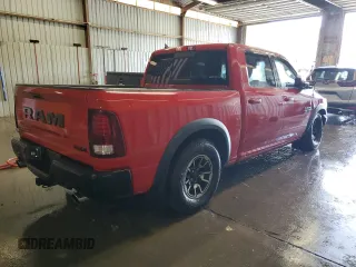 2016 Ram 1500 Rebel z VIN 1C6RR7YT4GS104758, wystawiony jako Copart lot #57092725 z przebiegiem 157 217 mil mil oraz Tytuł czysty. Historia ofert i sprzedaży dostępna na DreamBid. Obrazek 3.