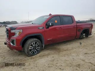 2021 GMC Sierra 1500 AT4 with VIN 3GTU9EET4MG461596, listed as a Copart auction lot 87712205 with 61,706 mi miles and Salvage Title. Bid and sale history available at carsss.com. Image 1.