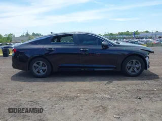 2021 Kia K5 LXS z VIN 5XXG14J25MG052084, wystawiony jako IAAI lot #42237008 z przebiegiem 31 278 mil mil oraz . Historia ofert i sprzedaży dostępna na DreamBid. Obrazek 13.