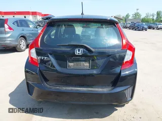 2015 Honda Fit LX z VIN 3HGGK5H51FM724566, wystawiony jako IAAI lot #42151755 z przebiegiem 168 744 mil mil oraz . Historia ofert i sprzedaży dostępna na DreamBid. Obrazek 16.