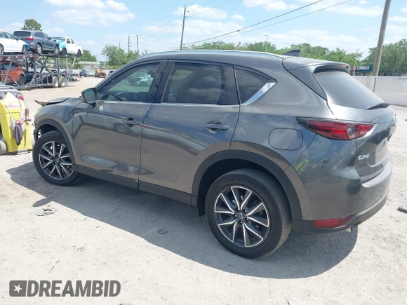 2017 Mazda CX-5 Grand Touring with VIN JM3KFADL3H0227655, listed as a IAAI auction lot 41897981 with 103,545 mi miles. Bid and sale history available at carsss.com. Image 3.