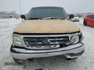 2002 Ford F-150 XL with VIN 1FTRF17202KD31428, listed as a Copart auction lot 45582885 with 218,548 mi miles and Salvage title. Bid and sale history available at DreamBid. Image 5.